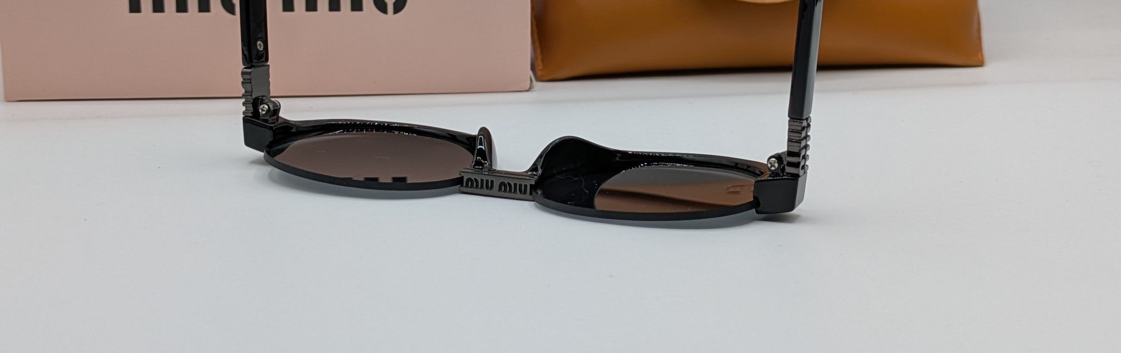 MIUMIU HALF ROUND