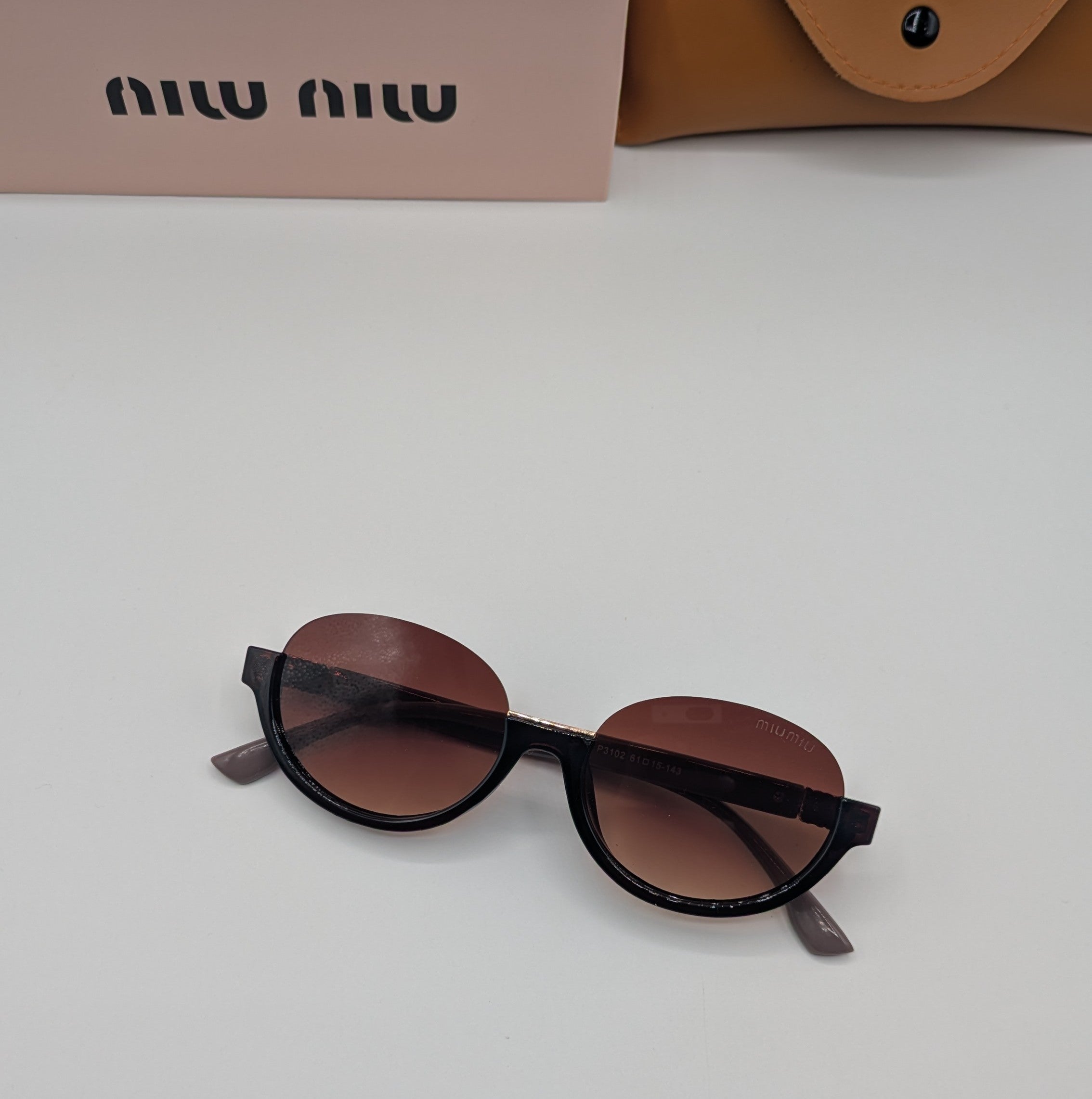 MIUMIU HALF ROUND