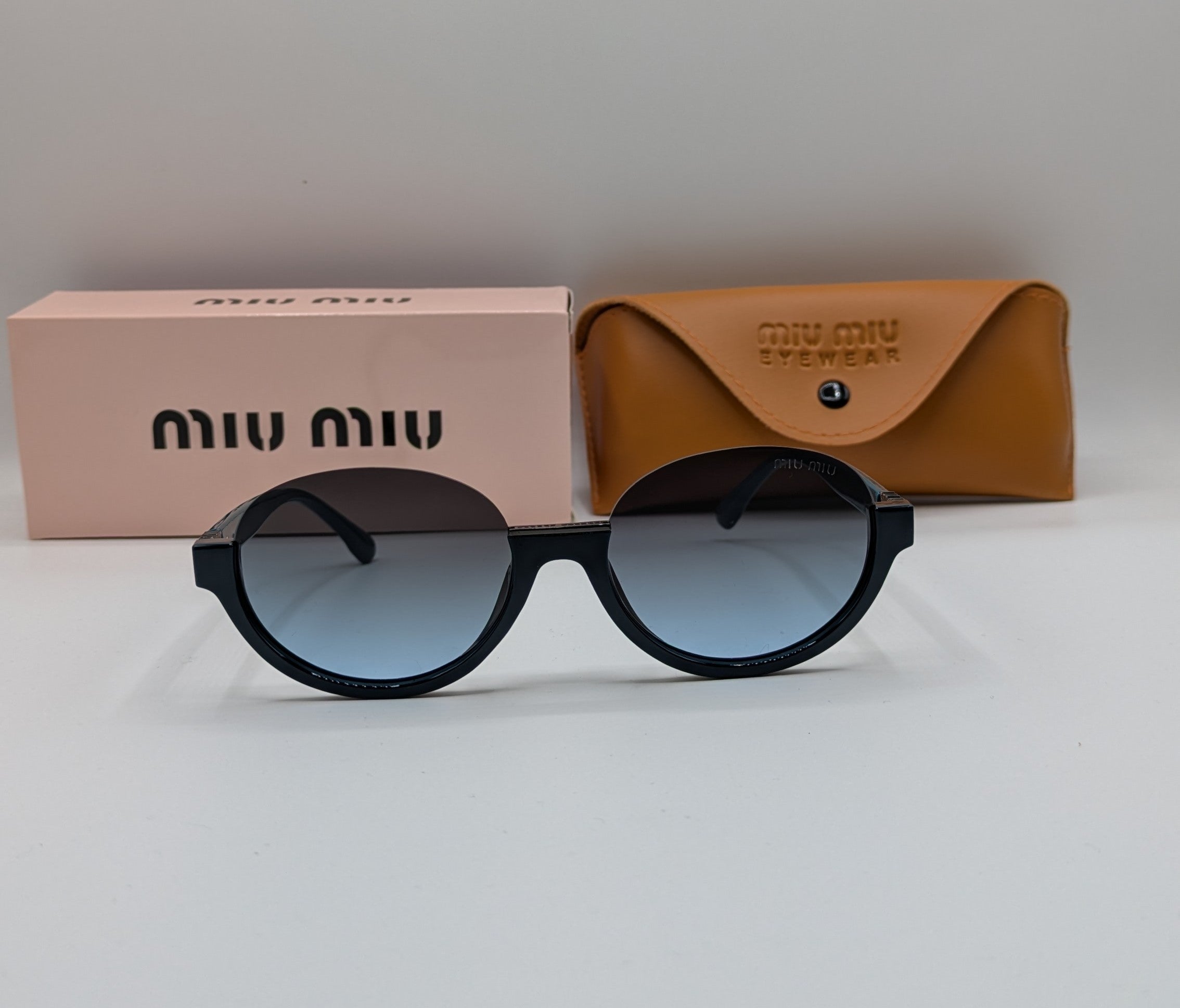 MIUMIU HALF ROUND