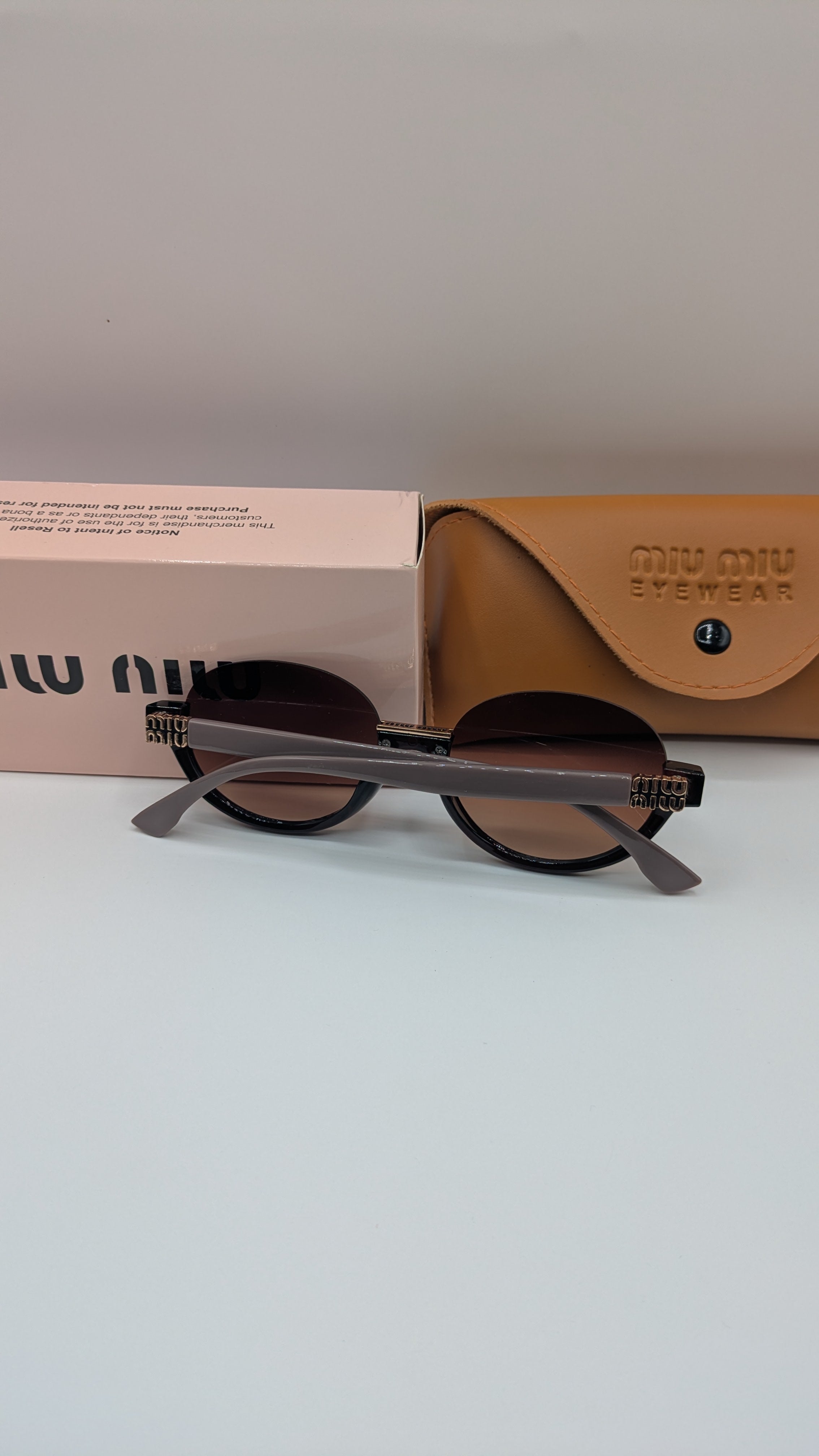 MIUMIU HALF ROUND