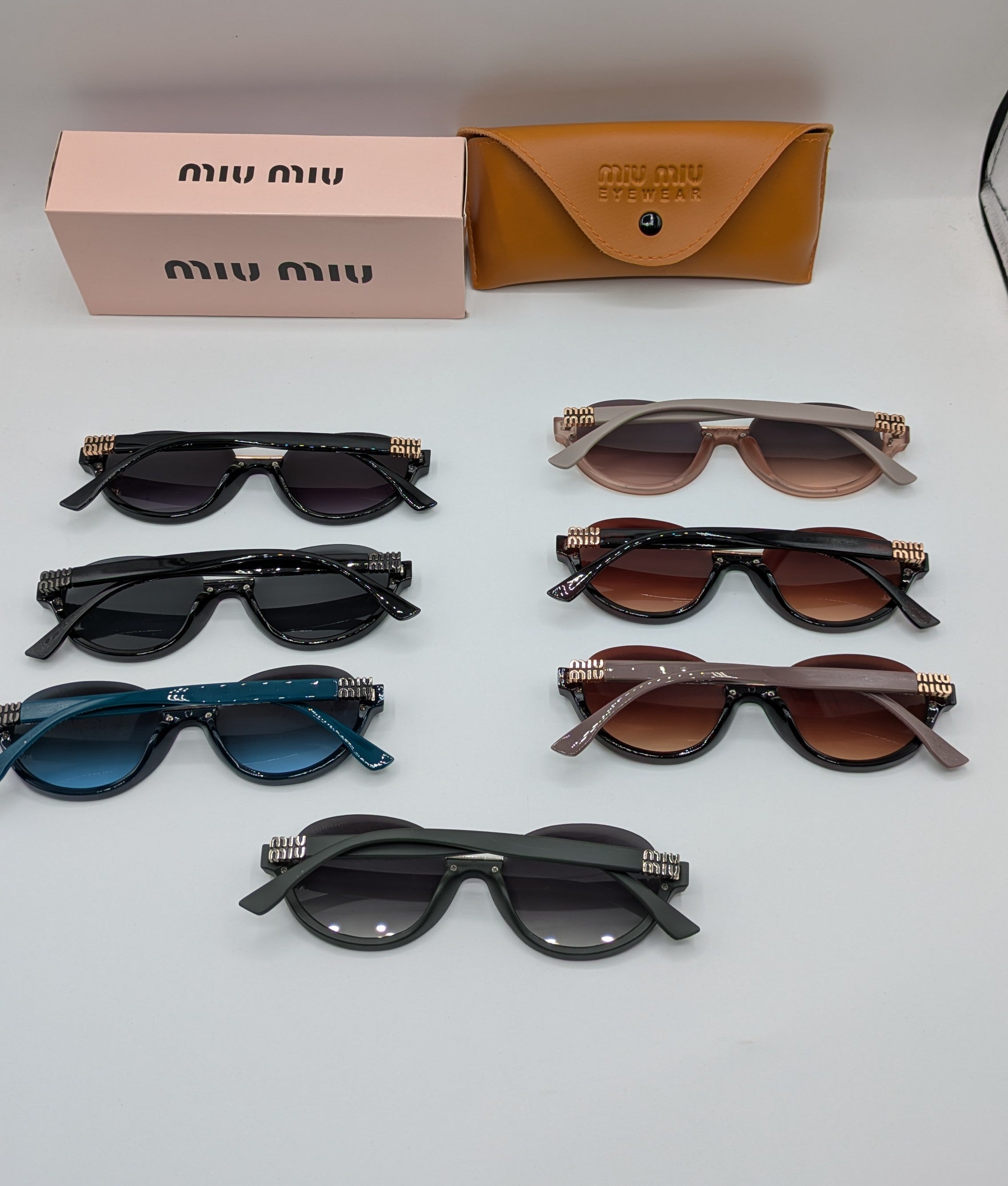 MIUMIU HALF ROUND