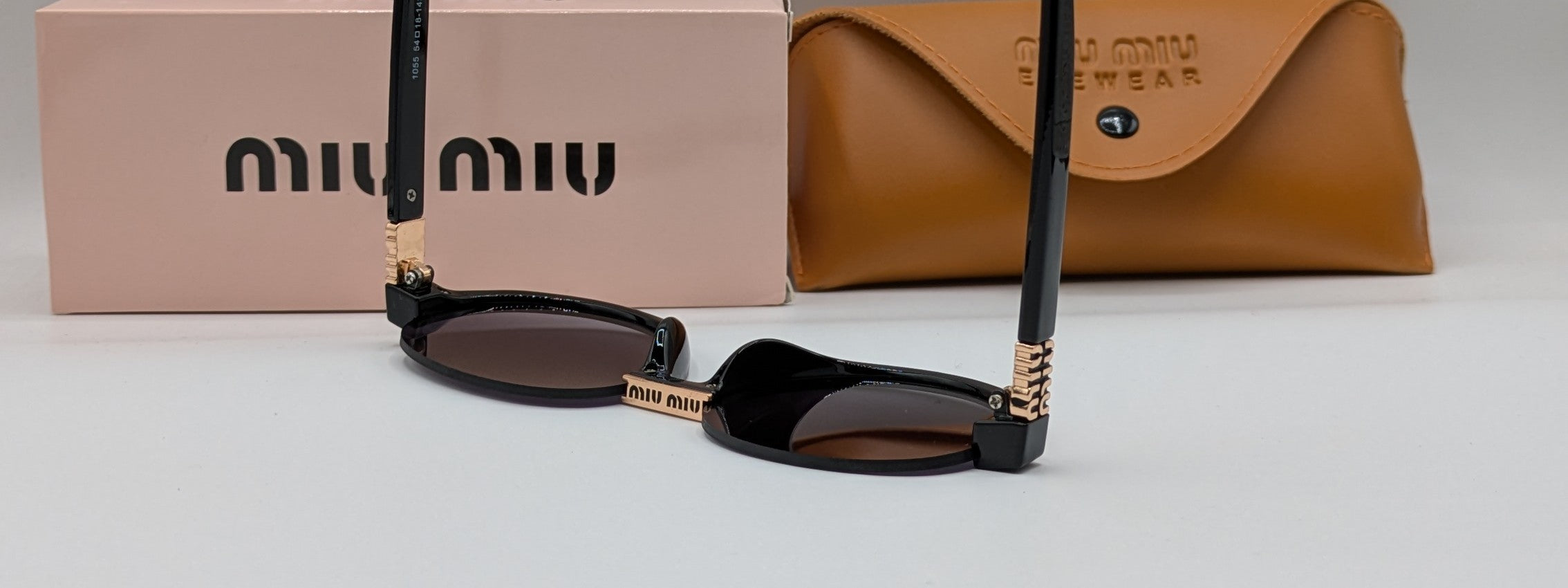 MIUMIU HALF ROUND