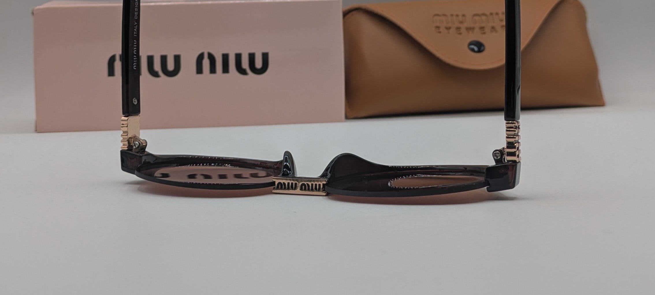 MIUMIU HALF ROUND